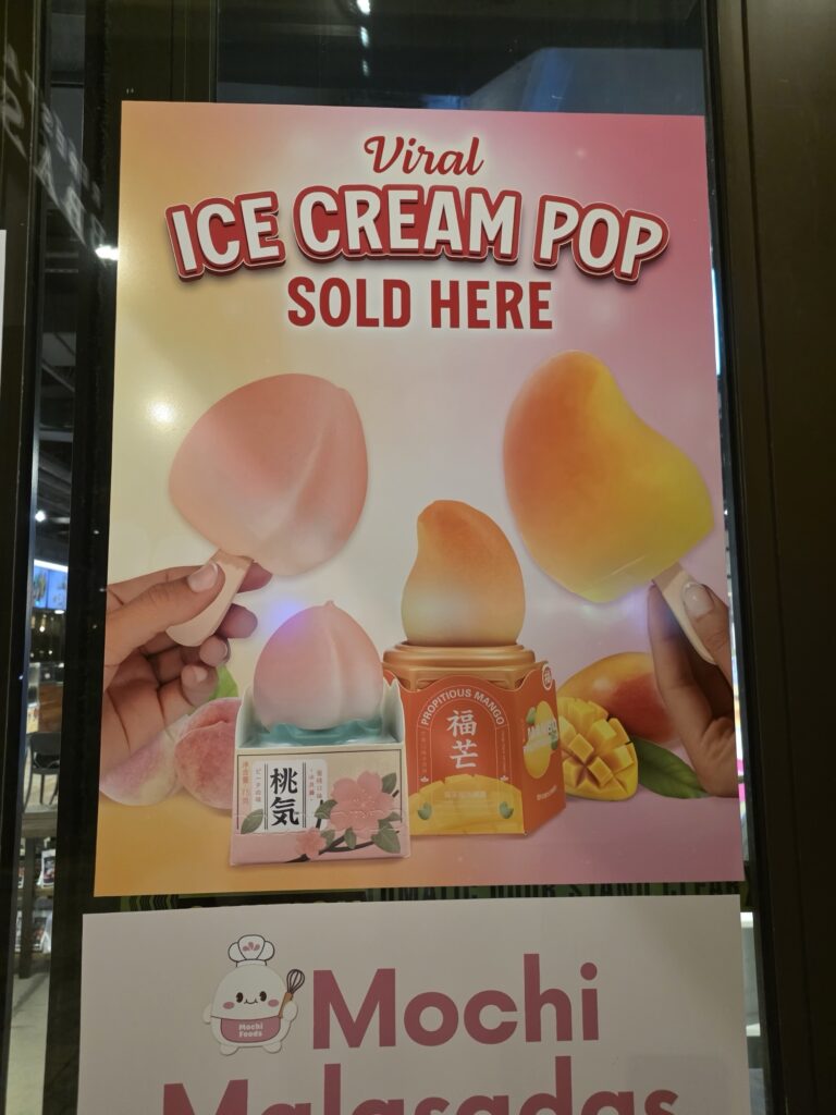 Propitious Mango Ice Cream at a market next to Kona Coffee in Waikiki