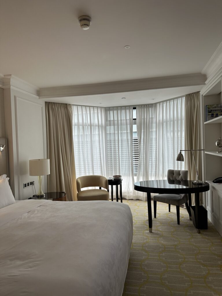 Luxury room interior at The Langham Hong Kong with classic decor