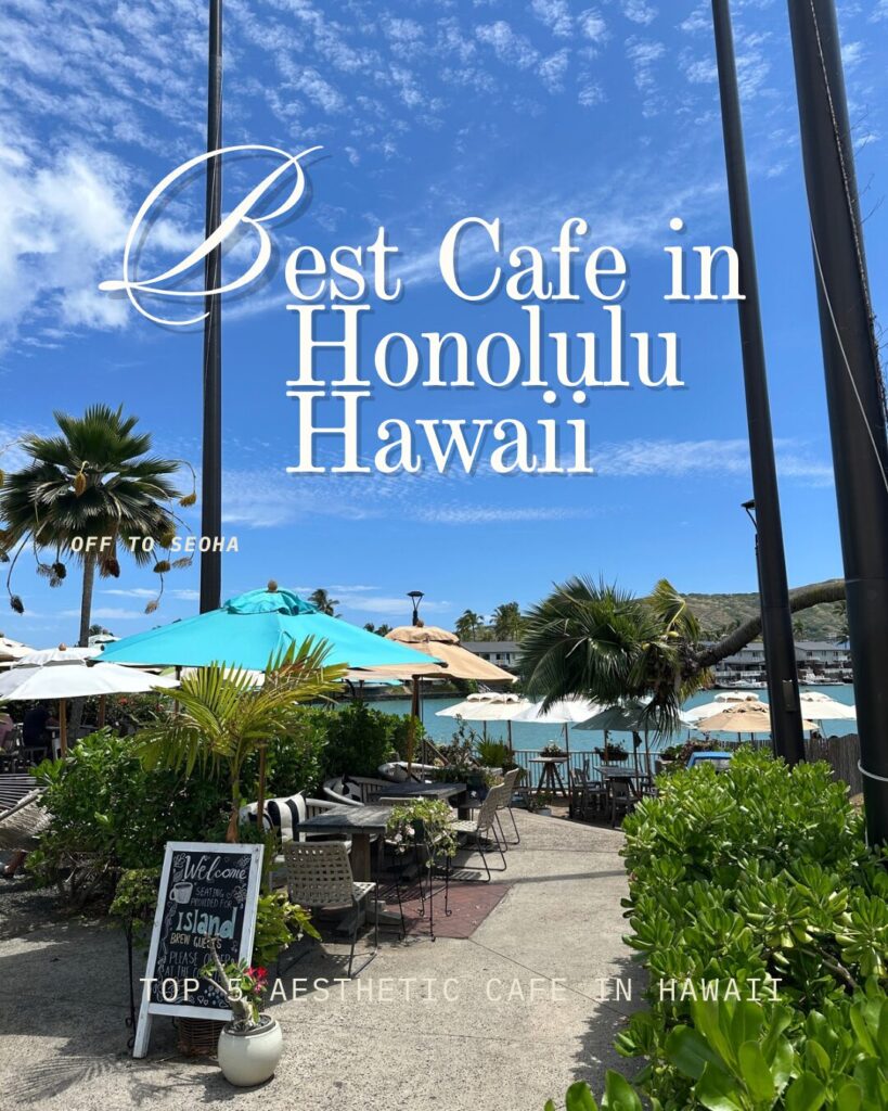 Outdoor seating with blue umbrellas at Island Brew Coffeehouse in Hawaii Kai with harbor view