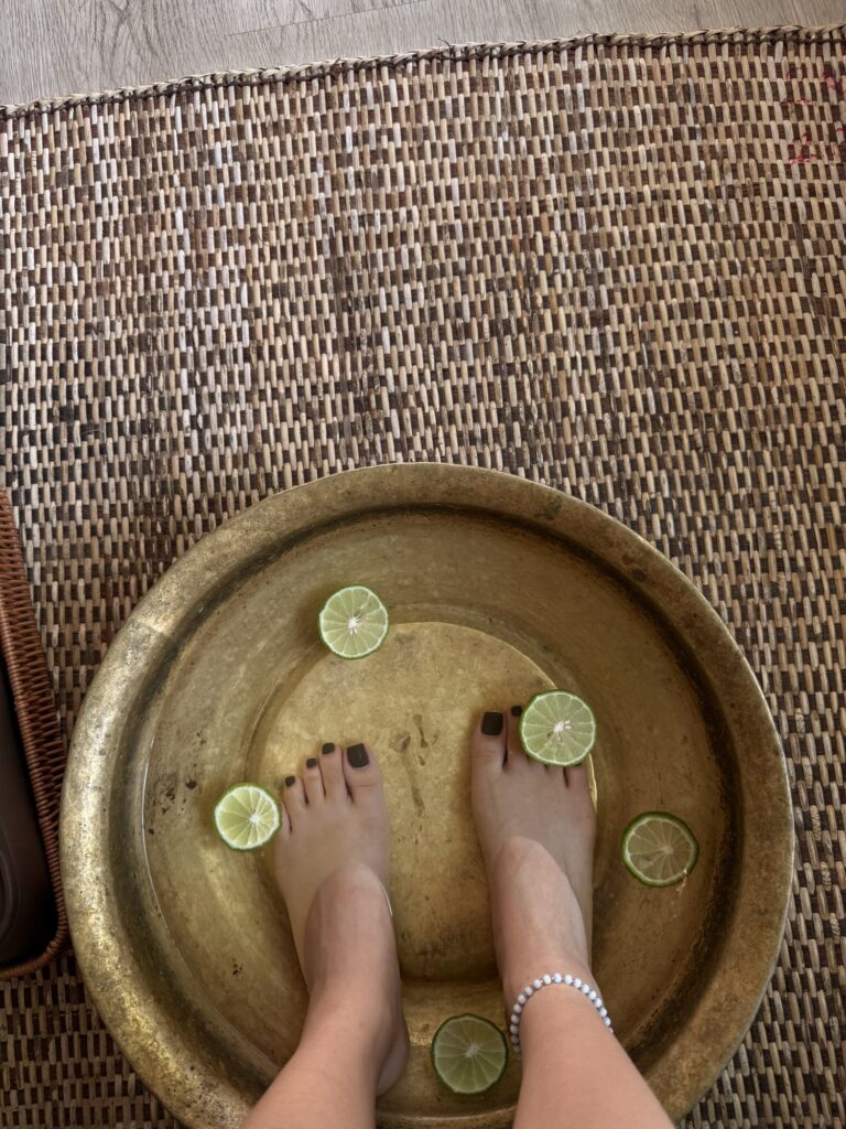 Relaxing foot soak ritual before massage treatment at Cheeva Spa