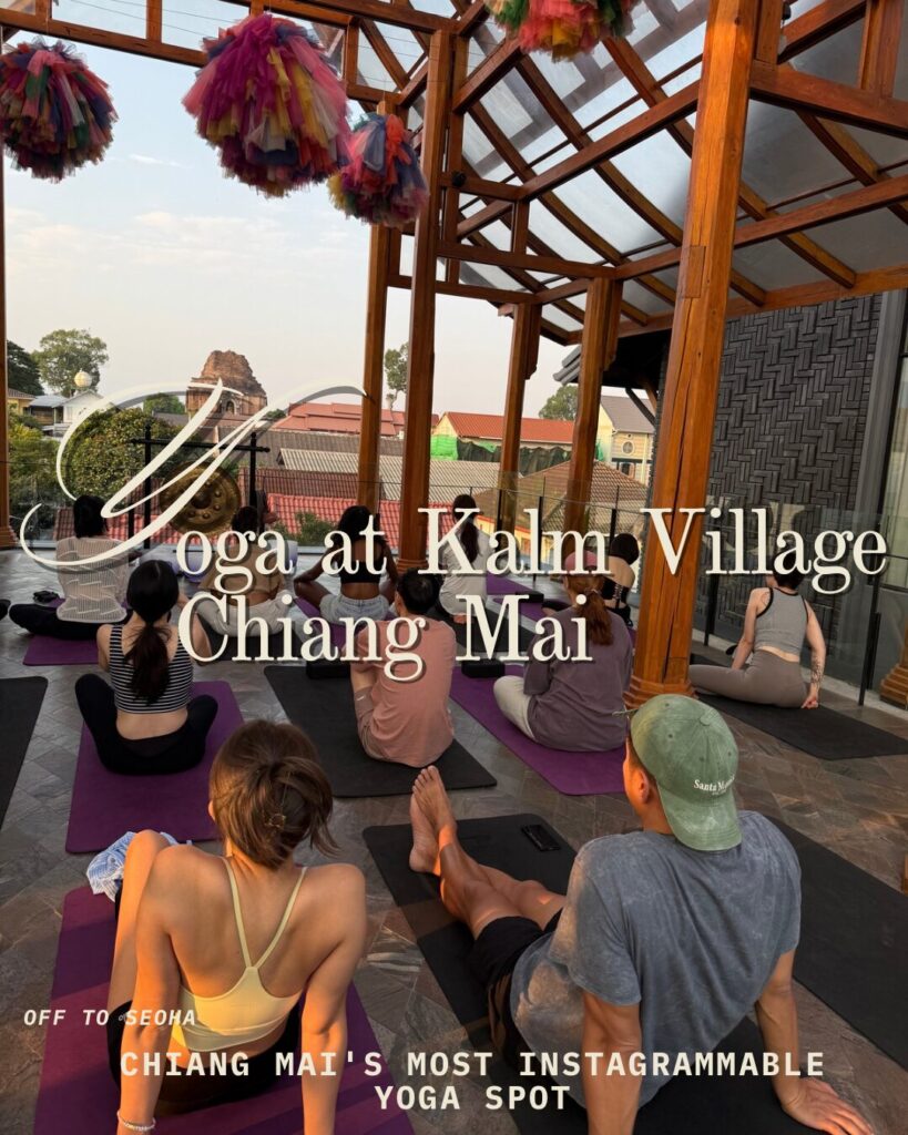 oga at Kalm Village Chiang Mai rooftop during sunset